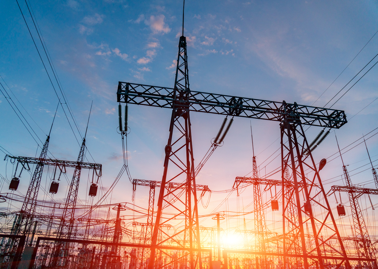 High-voltage power lines. Electricity distribution station. high voltage electric transmission tower. Distribution electric substation with power lines and transformers.