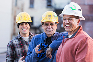 3 men with hard hats